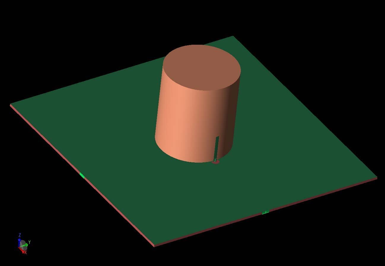 Figure 1:  A three-dimensional CAD view of the antenna geometry shows the DRA cylinder with coaxial probe feed, and the two input ports at the left and right of the substrate are shown in light green.  The second port is fed by a coupled slot in the…