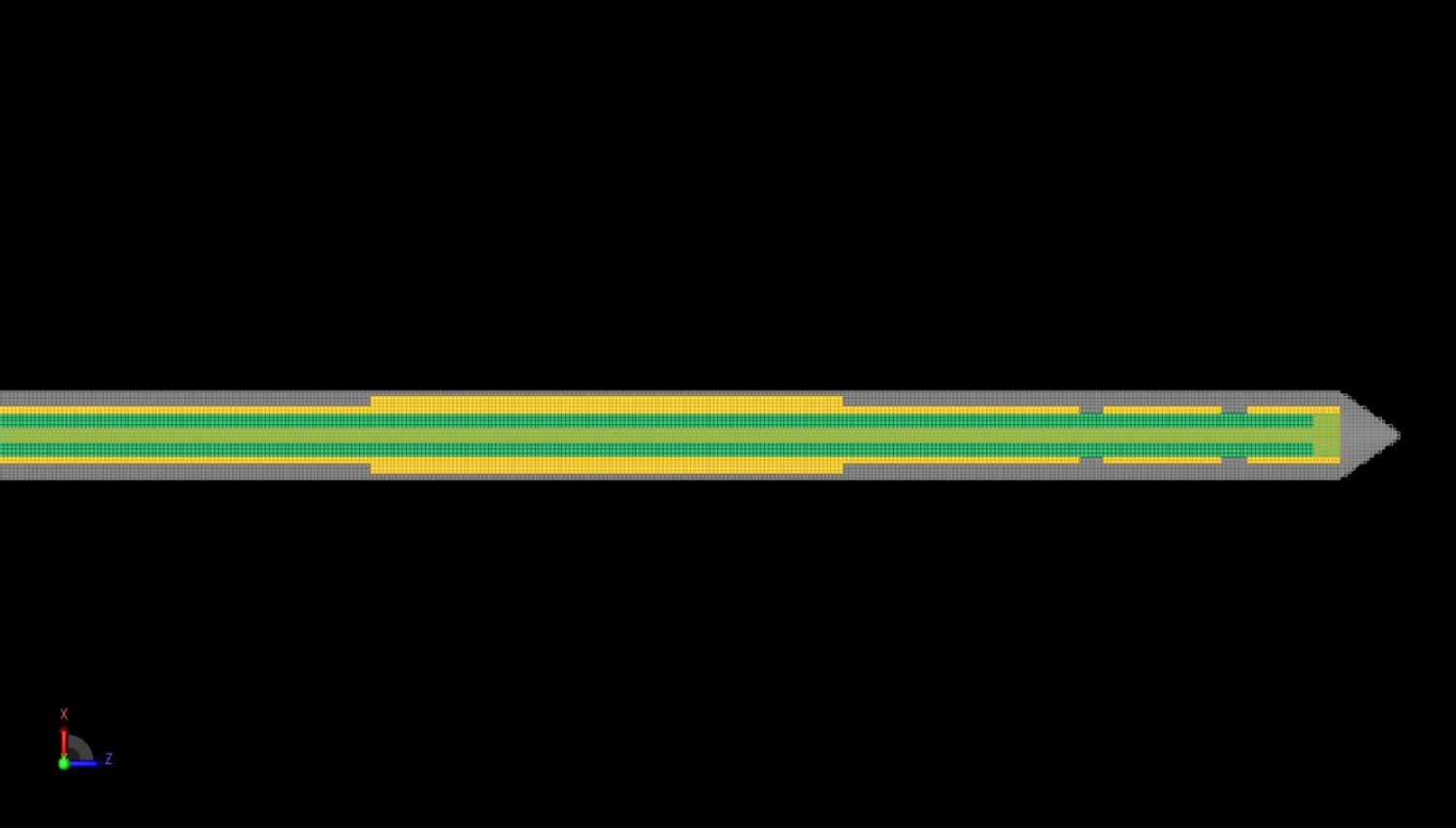 Figure 2: A cross-sectional view of the interior of the antenna is shown with the FDTD mesh displayed. Here the gridding is determined by PrOGrid.